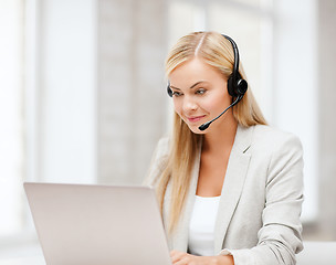 Image showing friendly female helpline operator