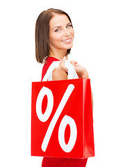 Image showing woman in red dress with shopping bags