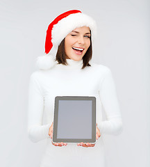 Image showing woman in santa helper hat with tablet pc