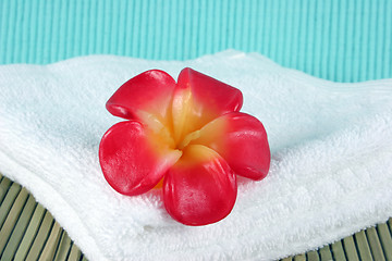 Image showing Candle on a white towel - spa products