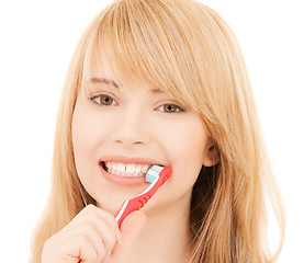 Image showing teenage girl with toothbrush