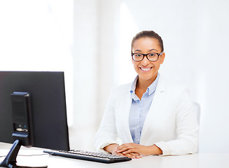 Image showing african businesswoman with computer in office