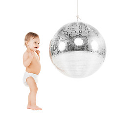 Image showing toddler playing with disco ball