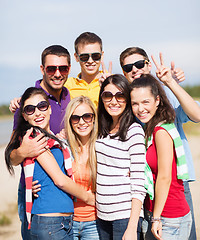 Image showing group of friends having fun on the beach