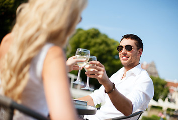 Image showing couple drinking wine in cafe