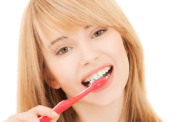 Image showing teenage girl with toothbrush