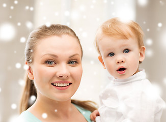 Image showing happy mother with adorable baby