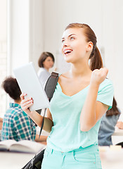 Image showing happy student girl with tablet pc