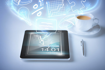 Image showing tablet pc with icons and coffee