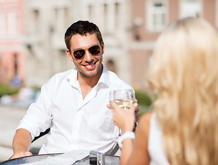 Image showing couple drinking wine in cafe