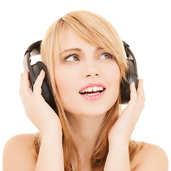 Image showing happy girl with headphones