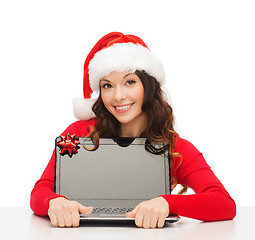 Image showing woman in santa helper hat with laptop computer