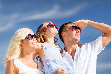 Image showing happy family with blue sky