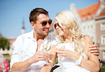 Image showing couple drinking wine in cafe