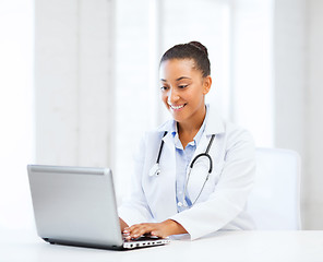 Image showing female doctor with laptop pc