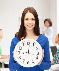 Image showing student showing clock