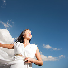 Image showing beautiful woman enjoying summer outdoors