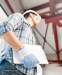 Image showing man with blueprint