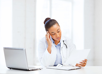 Image showing female doctor with laptop pc