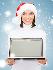 Image showing woman in santa helper hat with laptop computer