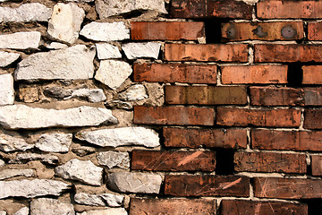 Image showing Brick and stone walls joint