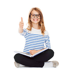 Image showing student girl studying and reading book