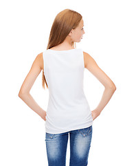 Image showing teenage girl in blank white shirt from the back