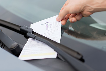 Image showing parking ticket on car windscreen