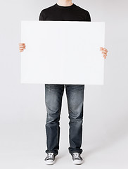 Image showing man showing white blank board