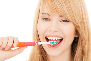 Image showing teenage girl with toothbrush