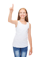 Image showing girl in blank white shirt pointing to something