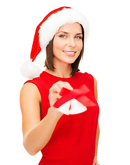 Image showing woman in santa helper hat with jingle bells