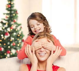 Image showing mother and daughter making a joke