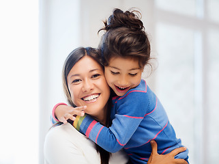 Image showing hugging mother and daughter