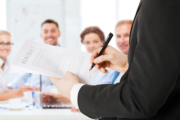 Image showing man signing contract