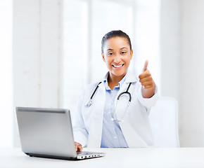 Image showing female doctor with laptop pc