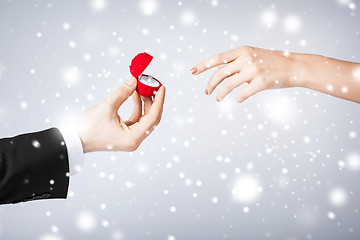 Image showing couple with wedding ring and gift box