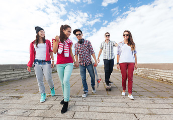 Image showing teenagers with skates outside