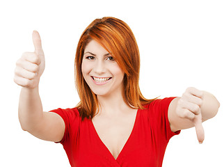 Image showing businesswoman with thumbs up and down