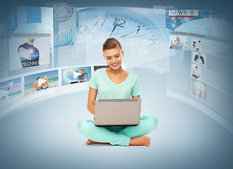 Image showing woman with laptop pc and virtual screens