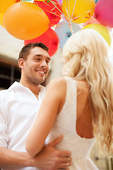 Image showing couple with colorful balloons