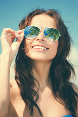 Image showing woman in bikini and sunglasses