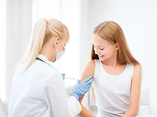 Image showing doctor doing vaccine to child in hospital