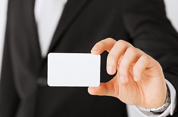 Image showing businessman showing blank card