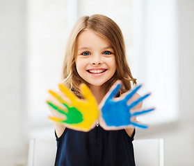 Image showing girl showing painted hands