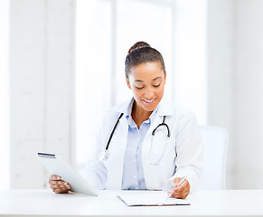 Image showing female doctor with tablet pc