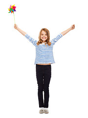 Image showing child with colorful windmill toy