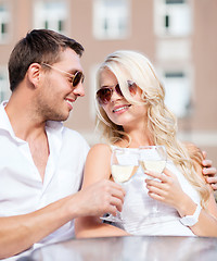 Image showing couple drinking wine in cafe