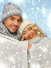 Image showing family couple under warm blanket