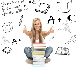 Image showing student with stack of books